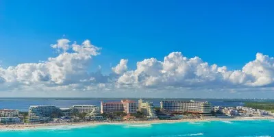 How much will a working vacation in Cancun cost? cover